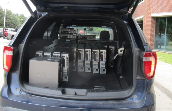 Computers donation by individual in car